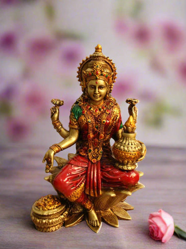 Elegant Handcrafted Poly Resin Kamal Laxmi Sitting in Multicolor - Style It by Hanika